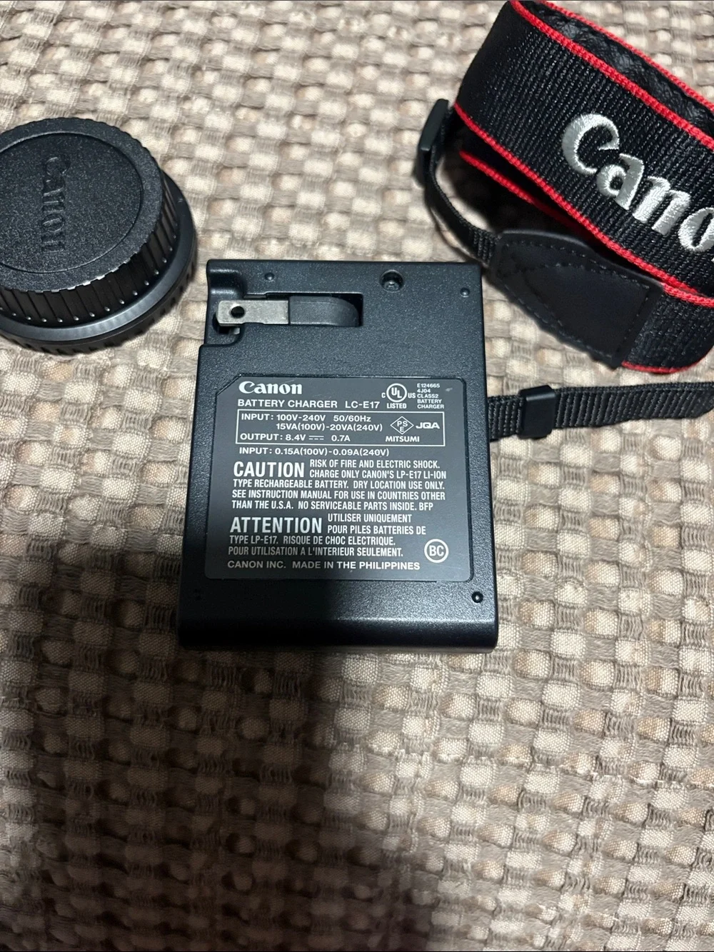 Canon Black Battery Charger with Black and Red Canon Neck Strap